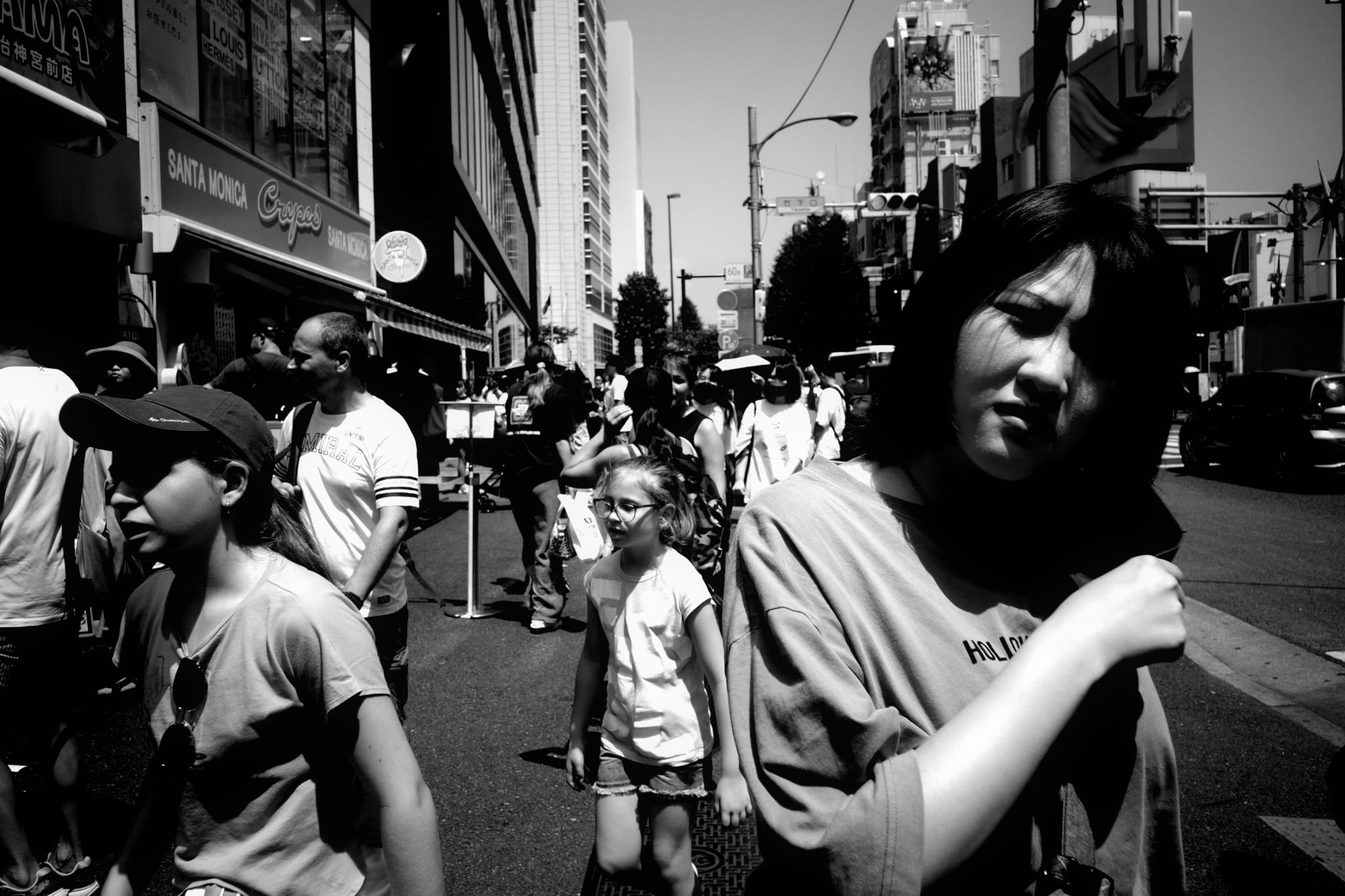 A couple walking through a narrow city lane