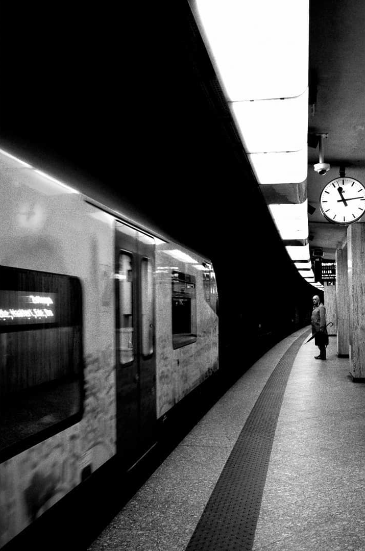 A train arriving beside a platform